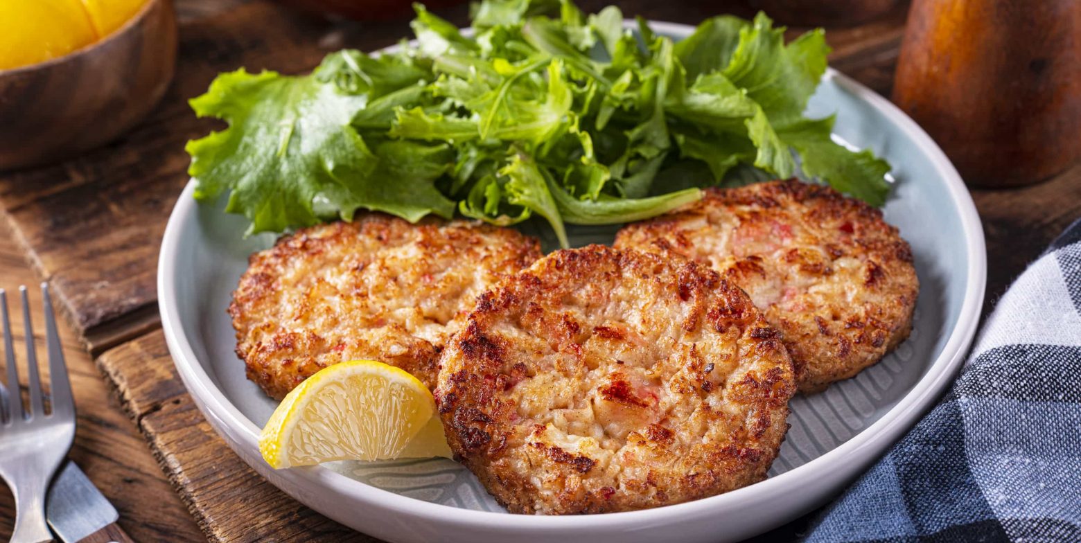 Crab cake served with a salad