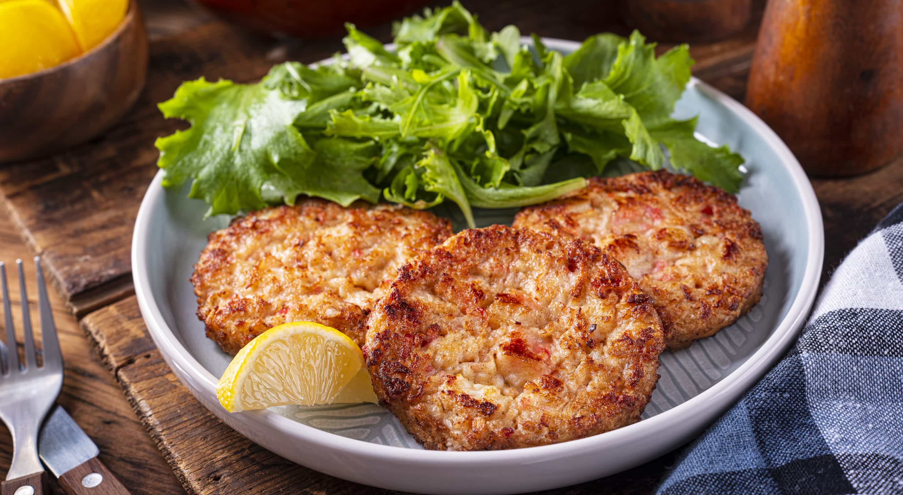 Crab cake served with a salad