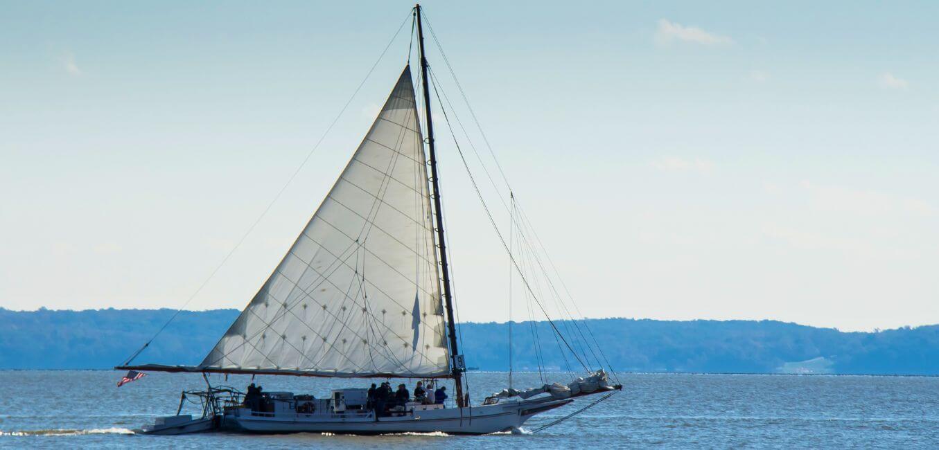 sailboat with passengers on chesapeake bay