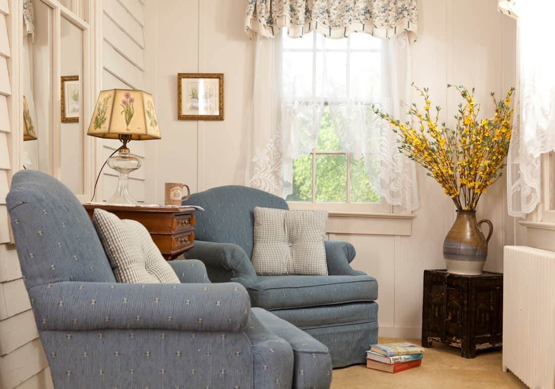 Seating area for two in the Emory Suite at Brampton Inn