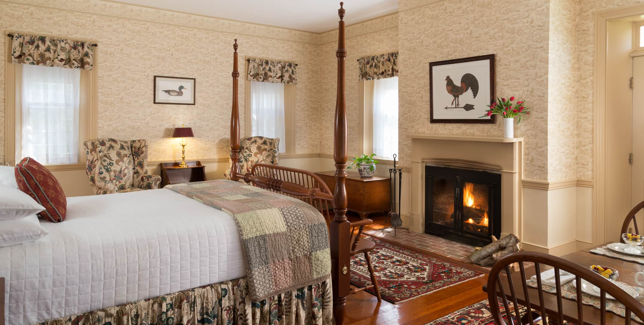 King bed and fireplace in the Sunset in the Garden Cottage at Brampton Inn