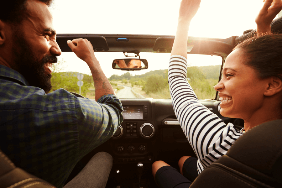 Couple Driving in a Convertible on Romantic Getaway in MD