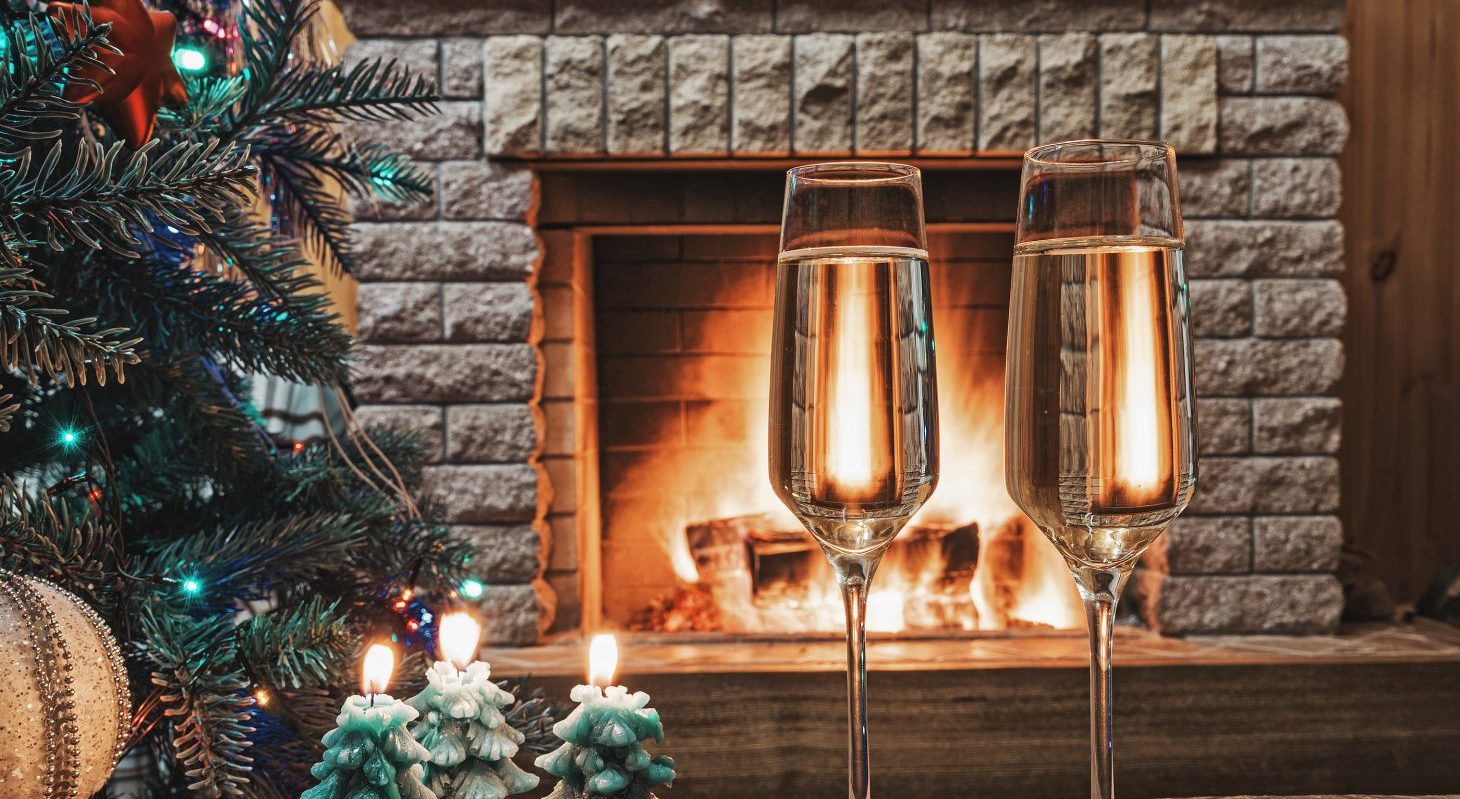 wine by fireplace with Christmas Tree in Maryland