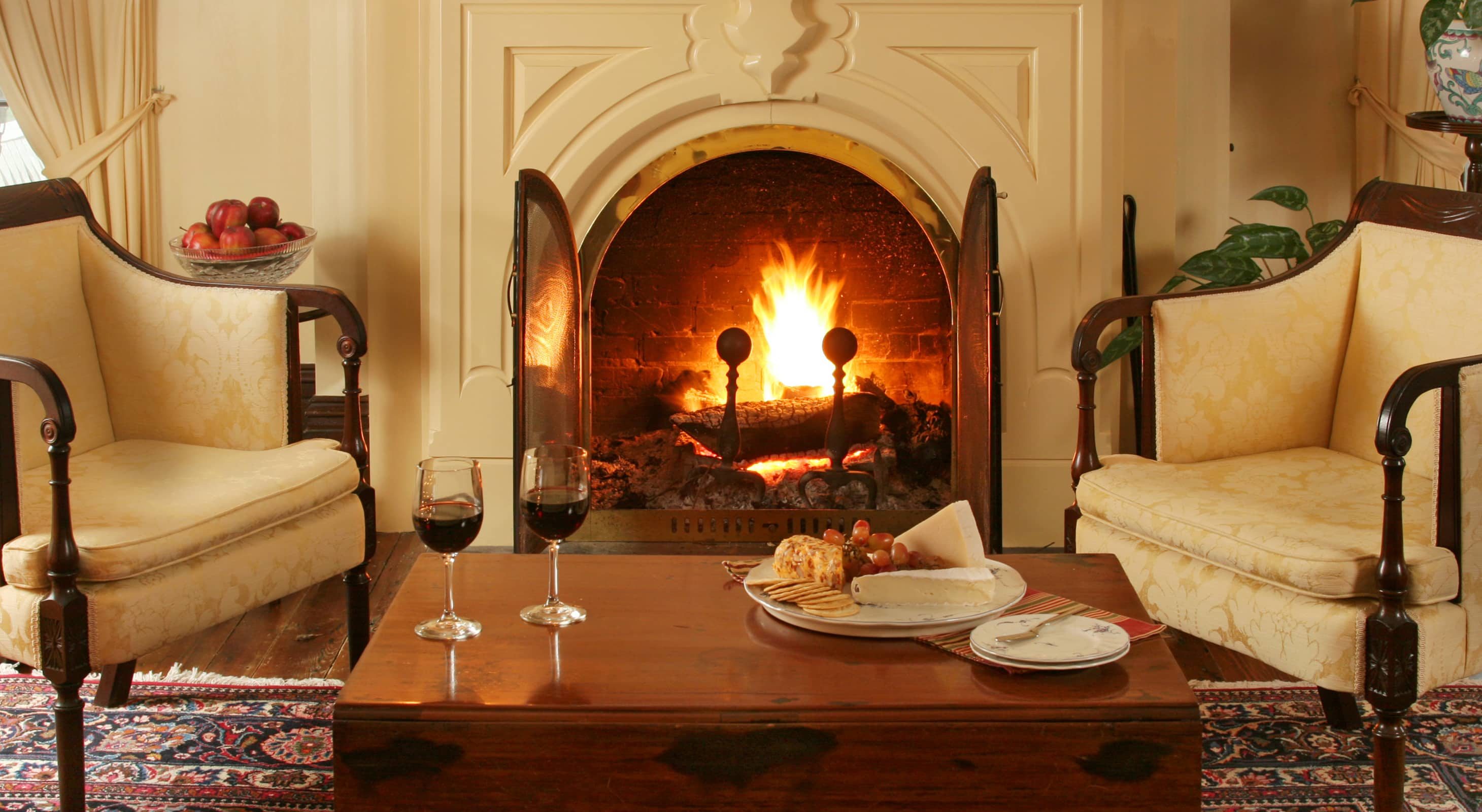 cozy fireplace with wine at our Maryland Inn