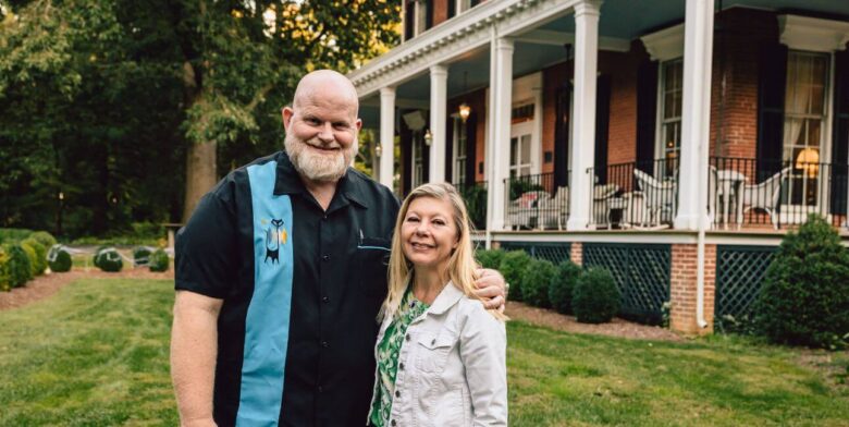 brampton 1860 owners dave and hilari posing in front of inn