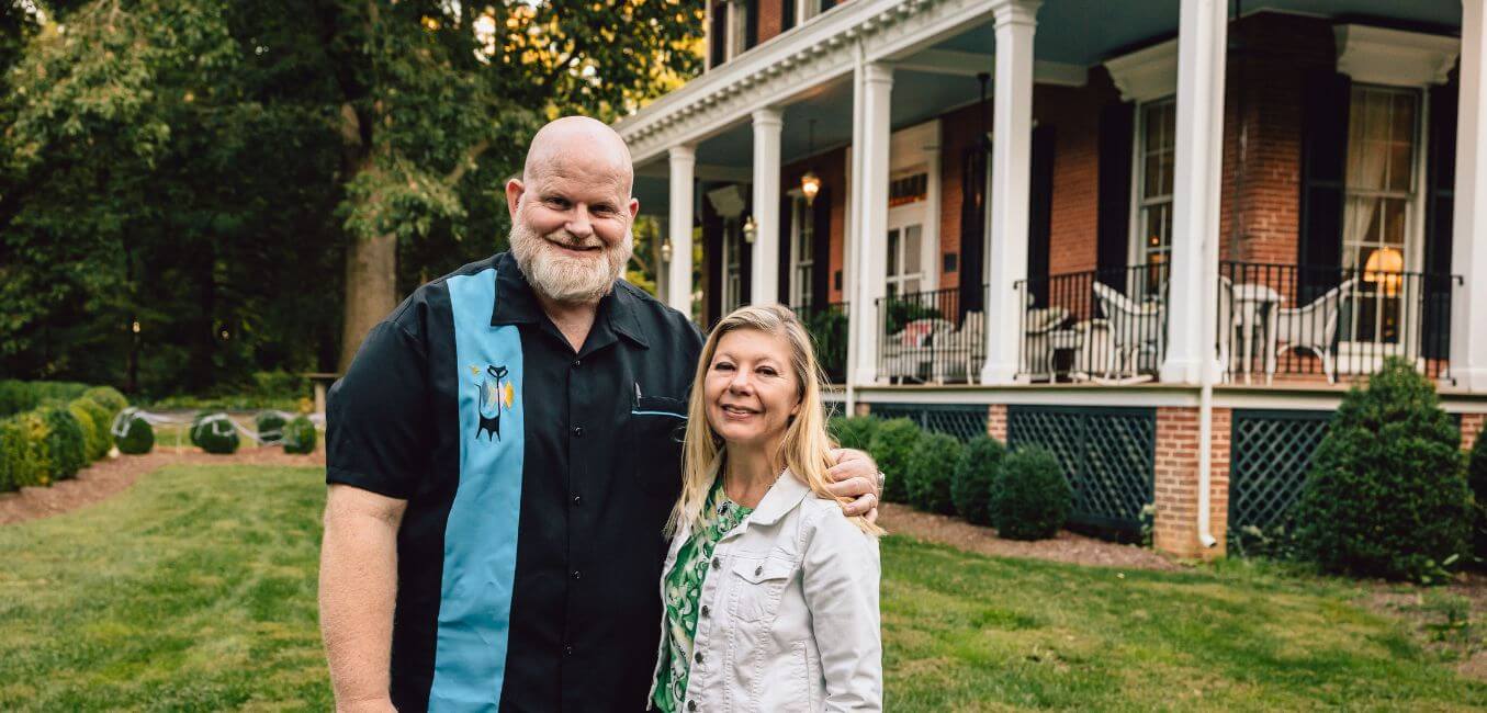 brampton 1860 owners dave and hilari posing in front of inn