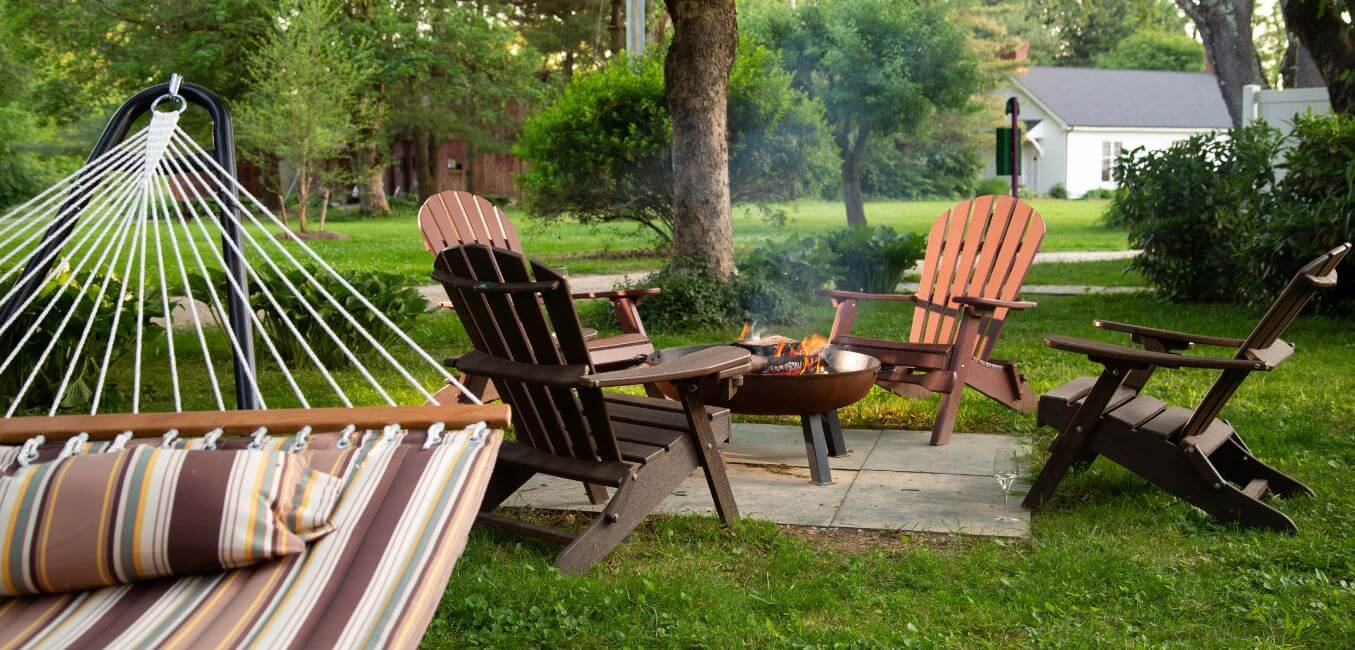 outdoor firepit and hammock of robins nest suite at brampton 1860