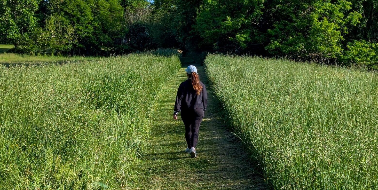 Solo traveler walking the trails at Brampton 1860 on Maryland’s Eastern Shore